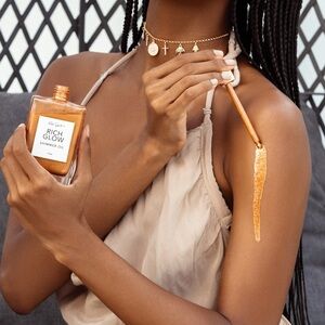 Shimmer oil by Richgirlz